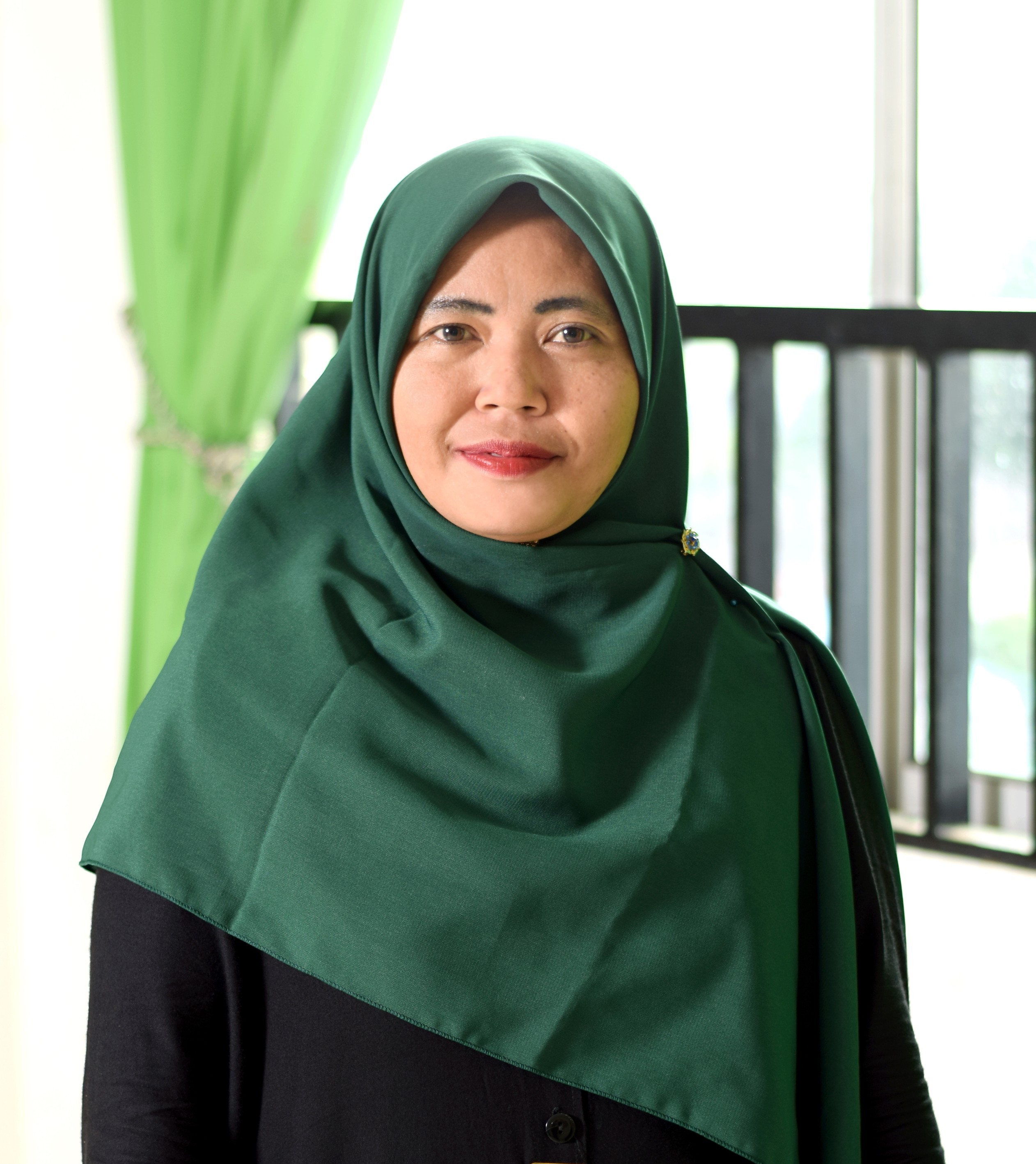 Juita Sri Agustina, S.Pd.I